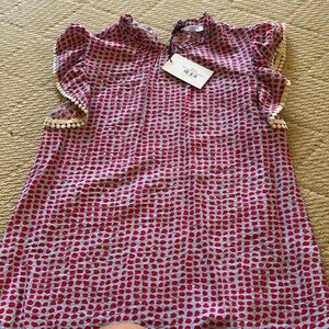 Adorable T. H. M. L. Shirt. Never been worn.